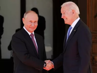 ﻿U.S. President Joe Biden and Russia's President Vladimir Putin shake hands as they arrive for the U.S.-Russia summit at Villa La Grange in Geneva, Switzerland, June 16, 2021. REUTERS/Kevin Lamarque