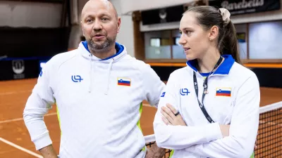 Andrej Krasevec, captain of Slovenia and Kaja Juvan during Day 1 of Billie Jean King Cup Qualifiers between Slovenia and Netherlands, on November 15, 2024 in Bela dvorana, Velenje, Slovenia. Photo by Vid Ponikvar / Sportida