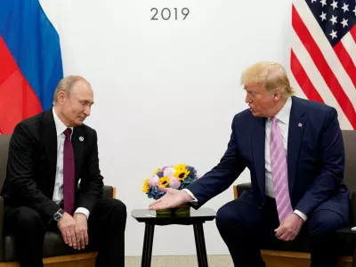 FILE PHOTO: U.S. President Donald Trump gestures during a bilateral meeting with Russia's President Vladimir Putin at the G20 leaders summit in Osaka, Japan, June 28, 2019. REUTERS/Kevin Lamarque/File Photo