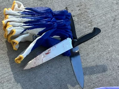 A bloody knife recovered at the scene lies on pavement after a suspect was arrested in a deadly stabbing attack in the Manhattan borough of New York City, U.S. November 18, 2024. NYPD News/Handout via REUTERS. THIS IMAGE HAS BEEN SUPPLIED BY A THIRD PARTY