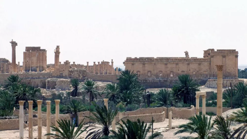 ﻿FILE - This file photo released on Sunday, May 17, 2015, by the Syrian official news agency SANA, shows the general view of the ancient Roman city of Palmyra, northeast of Damascus, Syria. Islamic State militants seized parts of the ancient town of Palmyra in central Syria on Wednesday after fierce clashes with government troops, renewing fears the extremist group would destroy the priceless archaeological site if it reaches the ruins. (SANA via AP, File)