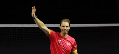 Tennis - Davis Cup Finals - Quarter Final - Netherlands v Spain - Palacio de Deportes Jose Maria Martin Carpena Arena, Malaga, Spain - November 20, 2024 Spain's Rafael Nadal waves at fans during a tribute to his career after The Netherlands eliminated Spain REUTERS/Jon Nazca