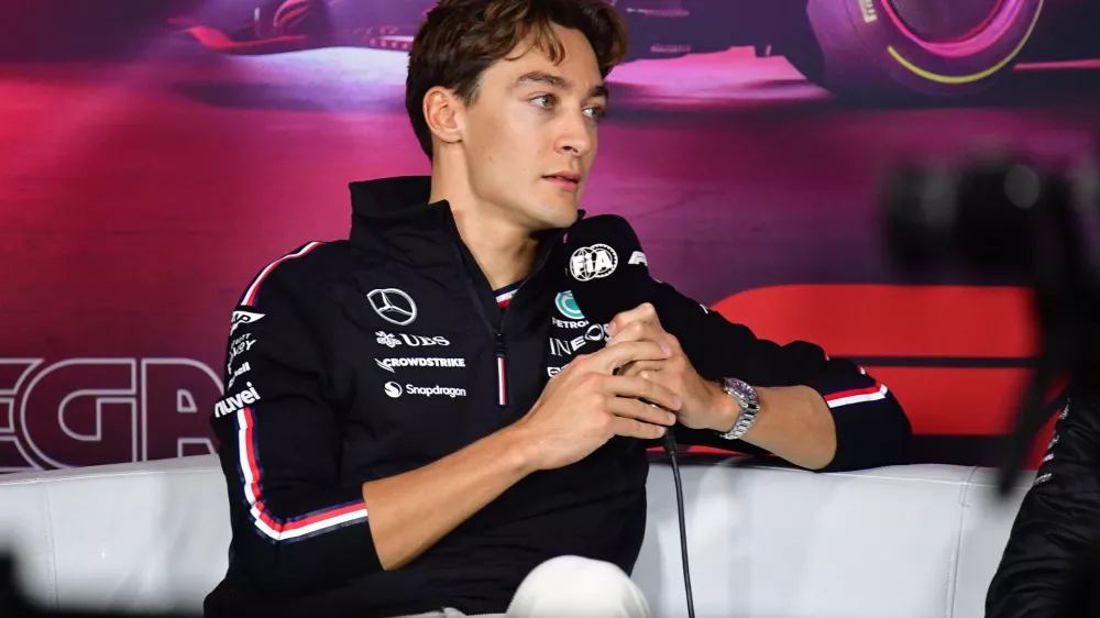 Nov 20, 2024; Las Vegas, Nevada, USA; Mercedes AMG Petronas driver George Russell (63) during media availabilities at Las Vegas Circuit. Mandatory Credit: Gary A. Vasquez-Imagn Images