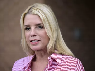 FILE - Pam Bondi, former Florida Attorney General, speaks to reporters outside an election integrity volunteer training, June 18, 2024, in Newtown, Pa. (AP Photo/Derik Hamilton, File)