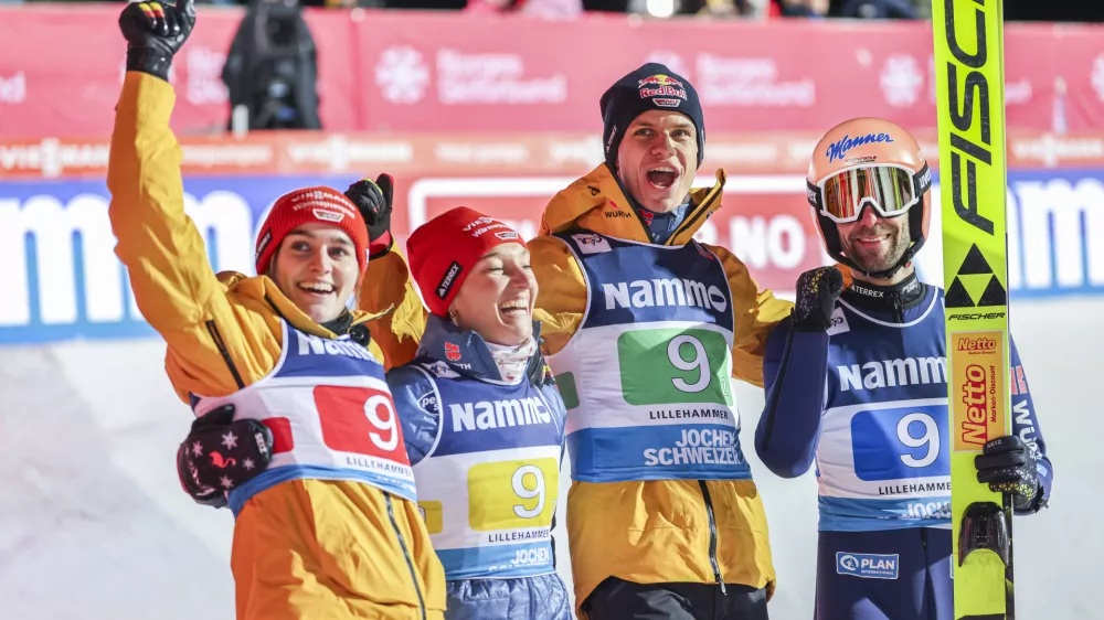 Germany's Selina Freitag, Katharina Schmid, Andreas Wellinger and Pius Paschke after the mixed team competition during the FIS Ski Jumping World Cup Mixed Large Hill Team in the Lysgardsbakken in Lillehammer, Norway, Friday Nov. 22, 2024. (Geir Olsen/NTB via AP)