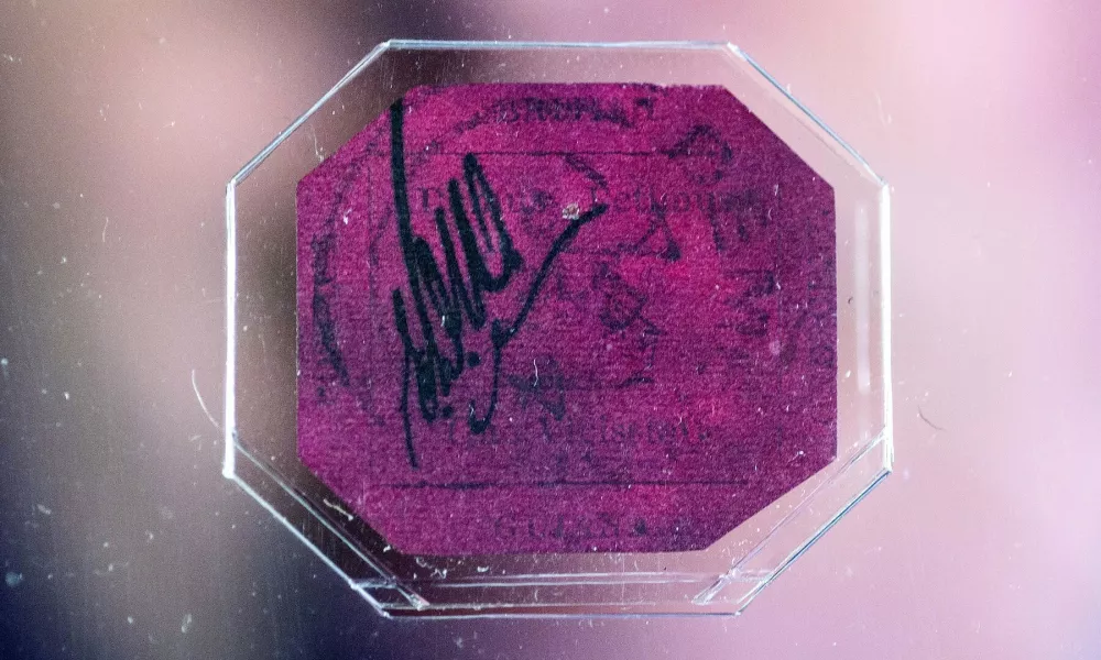 1856 British Guiana 1c Magenta stampPress preview of the most expensive stamp in the world, Sotheby's, London, Britain - 02 Jun 2014An extremely rare stamp is expected to sell up to $20 million (GBP 11.8 million) at auction. The small, octagonal-shaped British Guiana 1c Magenta stamp will go under the hammer at a Sotheby's auction in New York on 17 June. It is the only known surviving example of its kind and dates from 1856. Printed in black on magenta paper, it features a sailing ship with the colony's Latin motto 'Damus Petimus Que Vicissim', which translates to ?We give and expect in return.? It is so rare that it been previously dubbed 'the Holy Grail of stamps.',Image: 229916489, License: Rights-managed, Restrictions:, Model Release: no / Foto: Profimedia