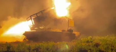 In this photo taken from a video released by Russian Defense Ministry press service on Wednesday, Nov. 13, 2024, the Russian army's multiple rocket launcher Solntsepyok fires towards Ukrainian positions in the border area of Kursk region, Russia. (Russian Defense Ministry Press Service via AP)