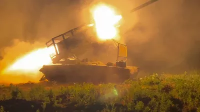 In this photo taken from a video released by Russian Defense Ministry press service on Wednesday, Nov. 13, 2024, the Russian army's multiple rocket launcher Solntsepyok fires towards Ukrainian positions in the border area of Kursk region, Russia. (Russian Defense Ministry Press Service via AP)