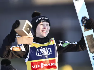 Slovenia's Nika Prevc celebrates after winning the Women's Individual HS140 competition at the ski jumping world cup in Lillehammer, Norway, Saturday, Nov. 23, 2024 (Geir Olsen/NTB Scanpix via AP)