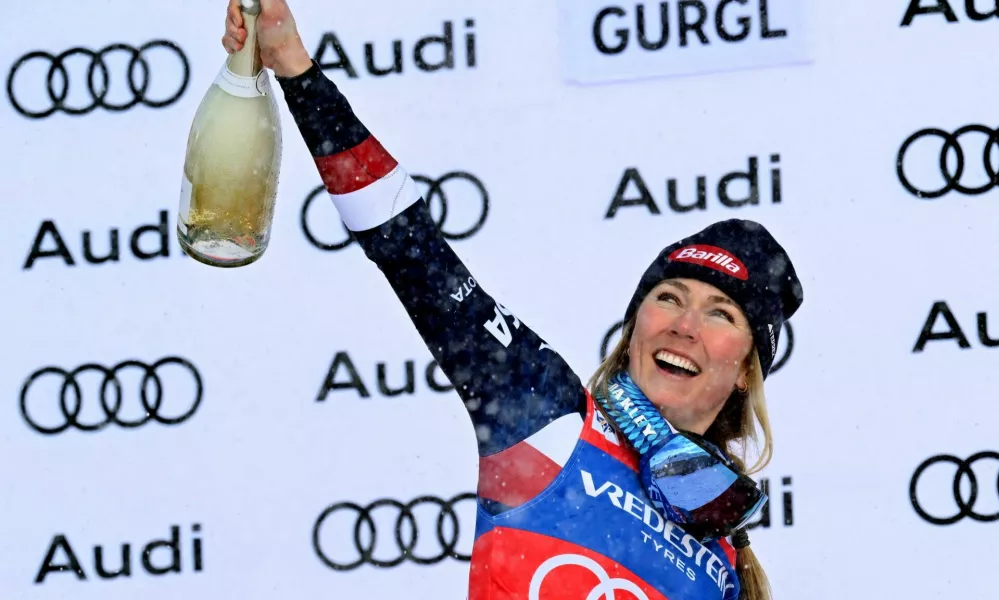 Alpine Skiing - FIS Alpine Ski World Cup - Women's Slalom - Gurgl, Austria - November 23, 2024 Mikaela Shiffrin of the U.S. celebrates on the podium after winning the women's slalom REUTERS/Angelika Warmuth