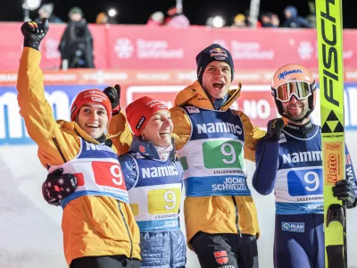 22 November 2024, Norway, Lillehammer: (L-R) Germany's Selina Freitag, Katharina Schmid, Andreas Wellinger and Pius Paschke celebrate wining the mixed team competition of the FIS Ski Jumping World Cup Mixed at the Lysgardsbakken. Photo: Geir Olsen/NTB/dpa