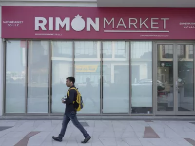 A man walks past Rimon Market, a Kosher grocery store managed by the late Rabbi Zvi Kogan, in Dubai, United Arab Emirates, Sunday, Nov. 24, 2024. (AP Photo/Jon Gambrell)