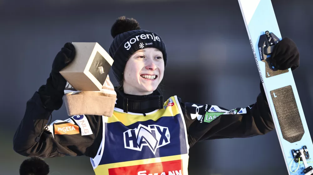 Slovenia's Nika Prevc celebrates after winning the Women's Individual HS140 competition at the ski jumping world cup in Lillehammer, Norway, Saturday, Nov. 23, 2024 (Geir Olsen/NTB Scanpix via AP)