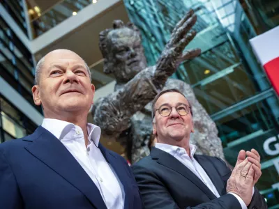 25 November 2024, Berlin: German Chancellor Olaf Scholz (L-R) stands with Boris Pistorius German Minister of Defense, at a press conference in the Willy Brandt House. Germany's centre-left Social Democratic Party (SPD) Executive Committee had previously nominated Federal Chancellor Olaf Scholz as the SPD's candidate for Chancellor in the early elections to the German Bundestag in 2025. Photo: Michael Kappeler/dpa