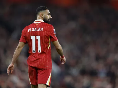 FILED - 02 November 2024, United Kingdom, Liverpool: Liverpool's Mohamed Salah walks on during the English Premier League soccer match between Liverpool and Brighton. Salah has said he is yet to receive a new contract offer from Liverpool and feels "more out than in" as he nears the end of his existing deal. Photo: Nigel French/PA Wire/dpa