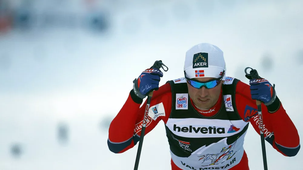 Petter Northug jr. of Norway reacts after missing to qualify for the final of the World Cup men's cross country sprint race in Tschierv January 1, 2013. REUTERS/ Dominic Ebenbichler (SWIT ZERLAND - Tags: SPORT SKIING)