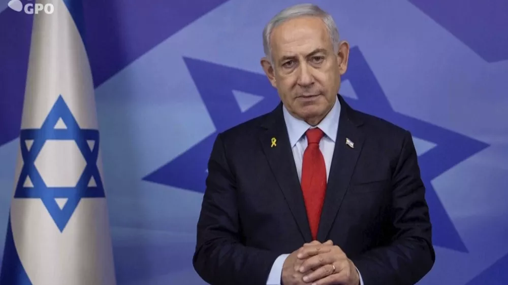 In this screen grab image from video provide by the Israeli Government Press Office, Israeli Prime Minister Benjamin Netanyahu makes a televised statement Tuesday, Nov. 26, 2024, in Jerusalem, Israel. (Israeli Government Press Office via AP)