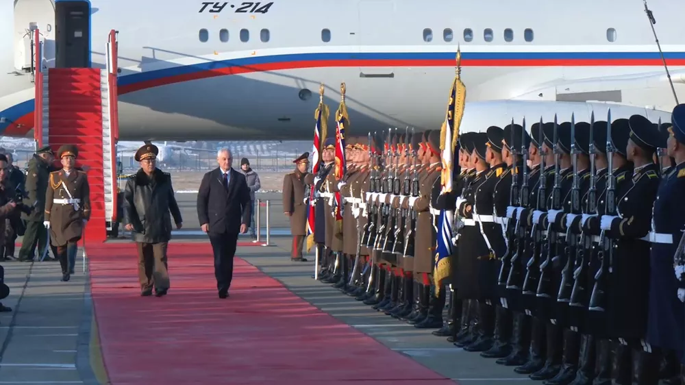 In this photo taken from a video released by Russian Defense Ministry press service, Russian Defense Minister Andrei Belousov, right on the red carpet, is welcomed by North Korean Defense Minister No Kwang Chol, left on the red carpet, upon his arrival at Pyongyang International Airport outside of Pyongyang, North Korea Friday, Nov. 29, 2024. (Russian Defense Press Service via AP)