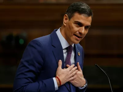 Spanish Prime Minister Pedro Sanchez speaks to Spain's opposition leader and People's Party president Alberto Nunez Feijoo (not pictured) as he addresses lawmakers about the government action during the floods in eastern Spain, at Parliament in Madrid, Spain, November 27, 2024. REUTERS/Susana Vera