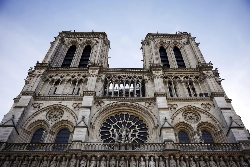 Notre-Dame Cathedral is seen in Paris, Friday Nov. 29 2024 ahead of French President Emmanuel Macron's final visit to the construction site to see the restored interiors before the iconic monument's reopening for worship on Dec. 8. (Sarah Meyssonnier, Pool via AP)