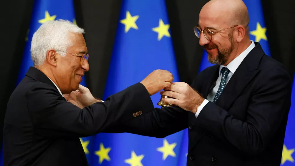 European Council incoming President Antonio Costa and outgoing President Charles Michel hold a bell during the ceremonial handover of the presidency, at the European Council headquarters in Brussels, Belgium November 29, 2024. REUTERS/Johanna Geron