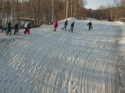 Workers walk up the end of the Nansen run at the Mont Tremblant ski resort, north of Montreal, Tuesday, March 13, 2009. Actress Natasha Richardson was hospitalized after falling during a private lesson on the beginners trail, further up from the location pictured, on Monday. (AP Photo/The Canadian Press, Peter McCabe)