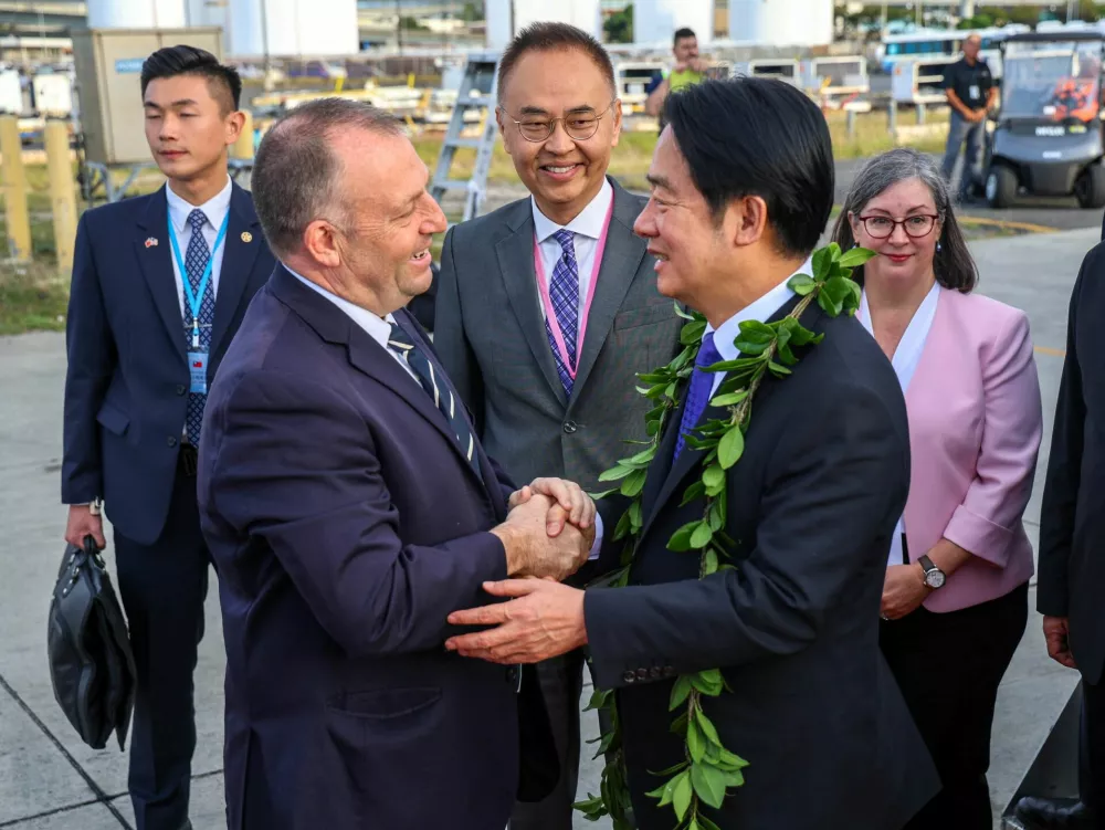 Hawaii Governor Josh Green greets Taiwan's President Lai Ching-te on his arrival at Daniel K. Inouye International Airport in Honolulu, Hawaii, U.S. November 30, 2024. Office of Hawaii Governor/Handout via REUTERS THIS IMAGE HAS BEEN SUPPLIED BY A THIRD PARTY. NO RESALES. NO ARCHIVES