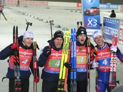 01 December 2024, Finland, Kontiolahti: (L-R) French biathletes Fabien Claude, Quentin Fillon Maillet, Eric Perrot and Emilien Jacquelin celebrate their victory after men's 4x7,5km relay during the IBU Biathlon World Cup in Kontiolahti. Photo: Minna Raitavuo/Minna Raitavuo/dpa