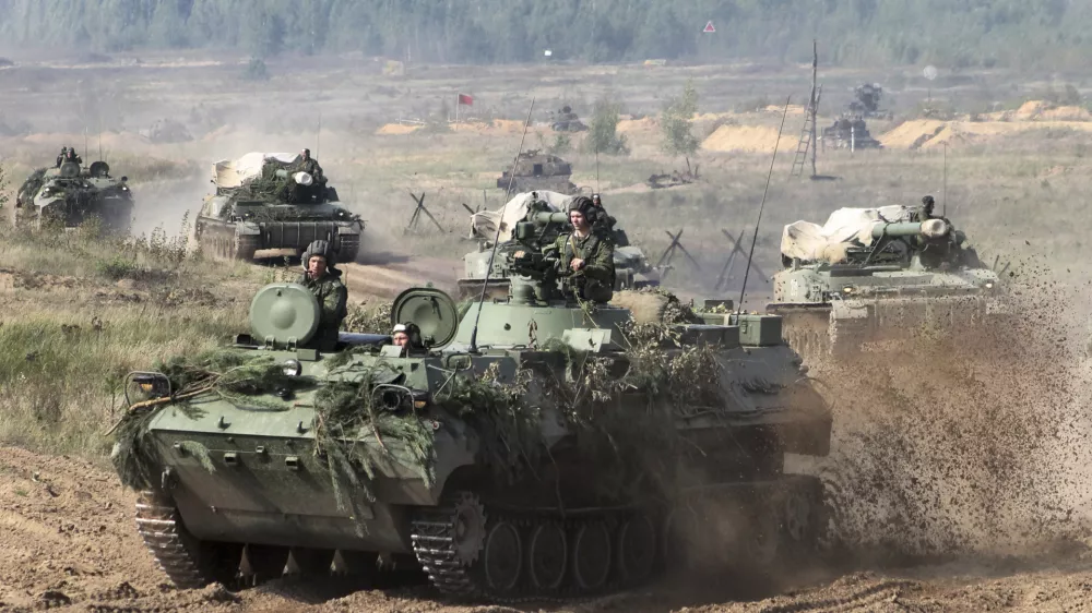 ﻿In this photo taken on Monday, Sept. 11, 2017, Belarusian army vehicles drive preparing for war games at an undisclosed location in Belarus. Russia and Belarus are holding a massive war games, Zapad 2017, that due to start on Thursday near the borders of Poland, Estonia, Latvia and Lithuania. (Vayar Military Agency photo via AP)