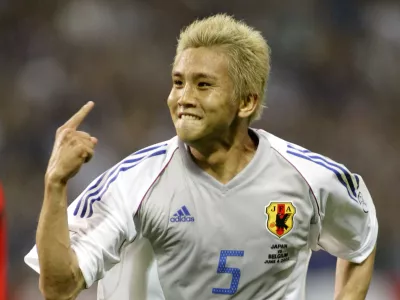 Japanese player Junichi Inamoto celebrates the 2-1 he scored for his team during a 2002 World Cup Group H match Japan vs Belgium in Saitama, Japan, Tuesday, June 4, 2002. The match ended 2-2. The other teams playing in Group H are Russia and Tunisia. (AP Photo/David Guttenfelder)