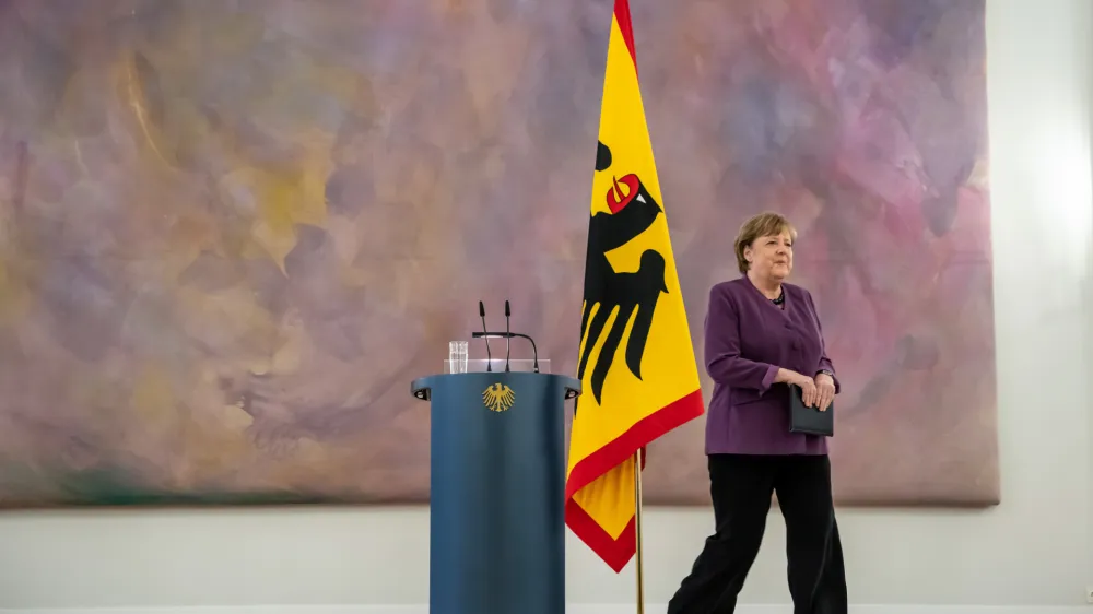 17 April 2023, Berlin: Angela Merkel, former German Chancellor, walks off the podium after being awarded the Grand Cross of the Order of Merit of the Federal Republic of Germany in Special Execution at Bellevue Palace. The order was previously awarded only to Chancellors Kohl and Adenauer. Photo: Michael Kappeler/dpa