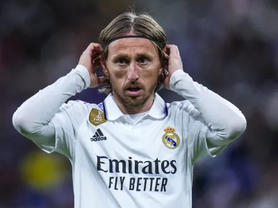 FILE - Real Madrid's Luka Modric gestures during Spanish La Liga soccer match between Real Madrid and Celta Vigo at the Santiago Bernabeu stadium in Madrid, Spain, Saturday, April 22, 2023. Real Madrid midfielder Luka Modric has injured his left thigh barely a week ahead of the Copa del Rey final and the Champions League semifinals, the Spanish club said Friday, April 28, 2023. (AP Photo/Manu Fernandez, File)