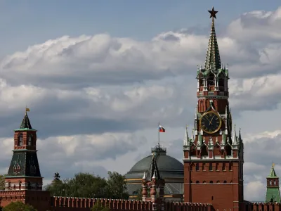 The Russian flag flies on the dome of the Kremlin Senate building behind Spasskaya Tower, in central Moscow, Russia, May 4, 2023. REUTERS/Stringer