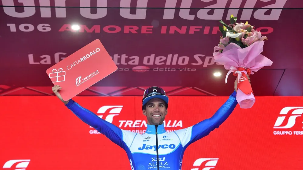 Cycling - Giro d'Italia - Stage 3 - Vasto to Melfi - Italy - May 8, 2023 Team Jayco AlUla's Michael Matthews celebrates on the podium after winning stage 3 REUTERS/Jennifer Lorenzini