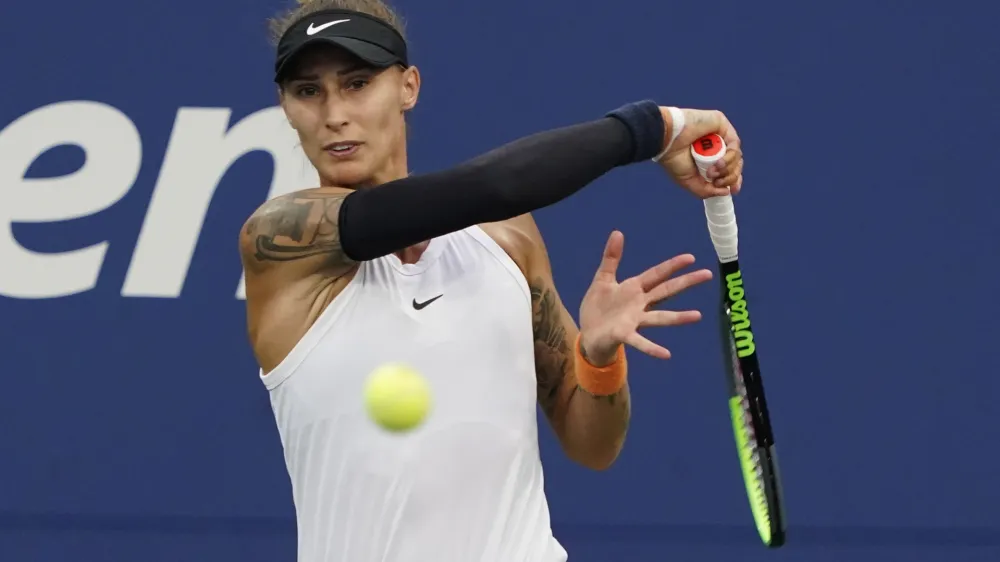 Polona Hercog, of Slovenia, strikes the ball during the first round of the US Open tennis championships, Tuesday, Aug. 31, 2021, in New York. (AP Photo/Elise Amendola)