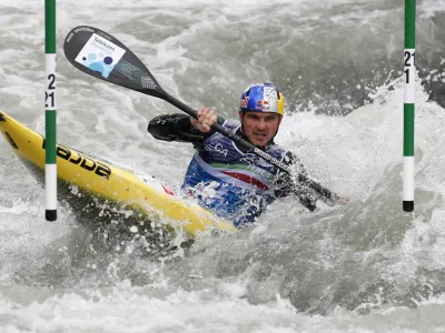 ﻿Canoeing - 2021 ECA Canoe Slalom European Championships, Ivrea, Italy - May 8, 2021 Slovenia's Peter Kauzer in action during the Men's Kayak (K1) final REUTERS/Alessandro Garofalo