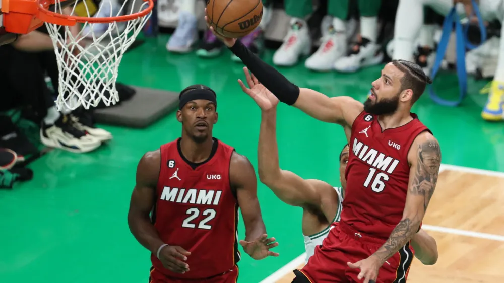 May 17, 2023; Boston, Massachusetts, USA; Miami Heat forward Caleb Martin (16) drives to the basket during the second half against the Boston Celtics in game one of the Eastern Conference Finals for the 2023 NBA playoffs at TD Garden. Mandatory Credit: Paul Rutherford-USA TODAY Sports