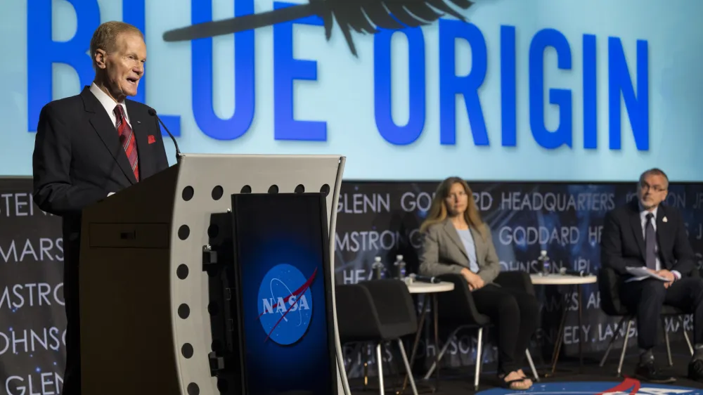 NASA Administrator Bill Nelson announces Blue Origin as the company selected to develop a sustainable human landing system for the Artemis V Moon mission, Friday, May 19, 2023 at the Mary W. Jackson NASA Headquarters building in Washington. (Aubrey Gemignani/NASA via AP)