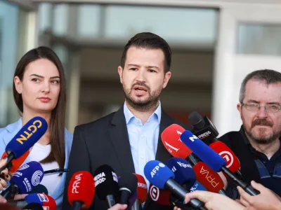 Jakov Milatovic, a presidential candidate from the Europe Now Movement, speaks to the media as he votes at a polling station along with his wife Milena during the run-off presidential elections in Podgorica, Montenegro, April 2, 2023. REUTERS/Marko Djurica