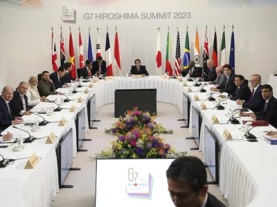 Leaders of the Group of Seven nations attend a session with other guest countries including Ukraine's Volodymyr Zelenskyy in Hiroshima, western Japan, Sunday, May 21, 2023. Monetary Fund. (Japan Pool via AP)