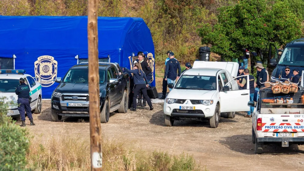 Police prepare to search a reservoir for the body of Madeleine McCann, who went missing in the Portuguese Algarve in May 2007, in Silves, Portugal, May 23, 2023. REUTERS/Luis Ferreira    NO RESALES. NO ARCHIVES.