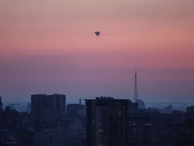 An explosion of a missile is seen in the sky over the city during a Russian missile strike, amid Russia's attack on Ukraine, in Kyiv, Ukraine May 26, 2023. REUTERS/Gleb Garanich