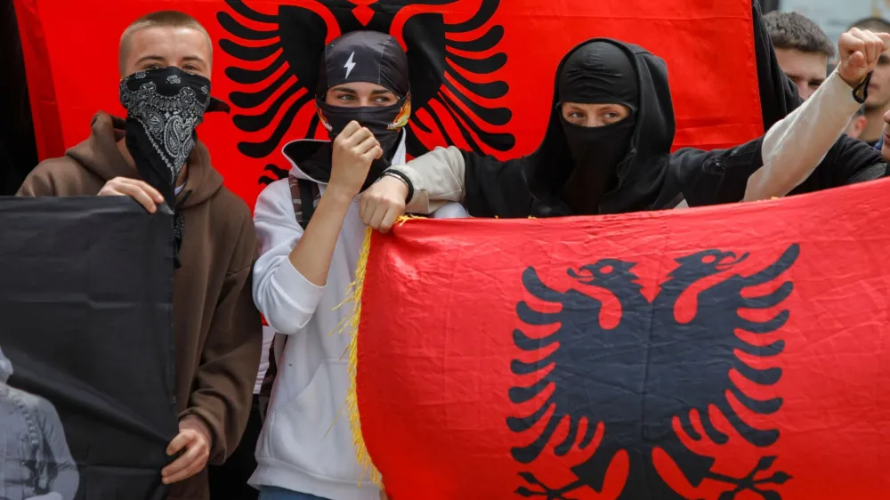 Albanians protest near the bridge which connects south and north Mitrovica, in Mitrovica, Kosovo, June 1, 2023. REUTERS/Ognen Teofilovski