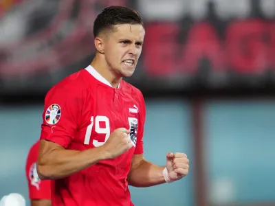 20 June 2023, Austria, Vienna: Austria's Christoph Baumgartner celebrates scoring his side's first goal during the UEFA Euro 2024 Qualifying Group F soccer match between Austria and Sweden at Ernst-Happel-Stadion. Photo: Georg Hochmuth/APA/dpa