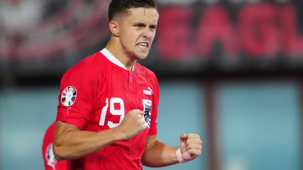 20 June 2023, Austria, Vienna: Austria's Christoph Baumgartner celebrates scoring his side's first goal during the UEFA Euro 2024 Qualifying Group F soccer match between Austria and Sweden at Ernst-Happel-Stadion. Photo: Georg Hochmuth/APA/dpa