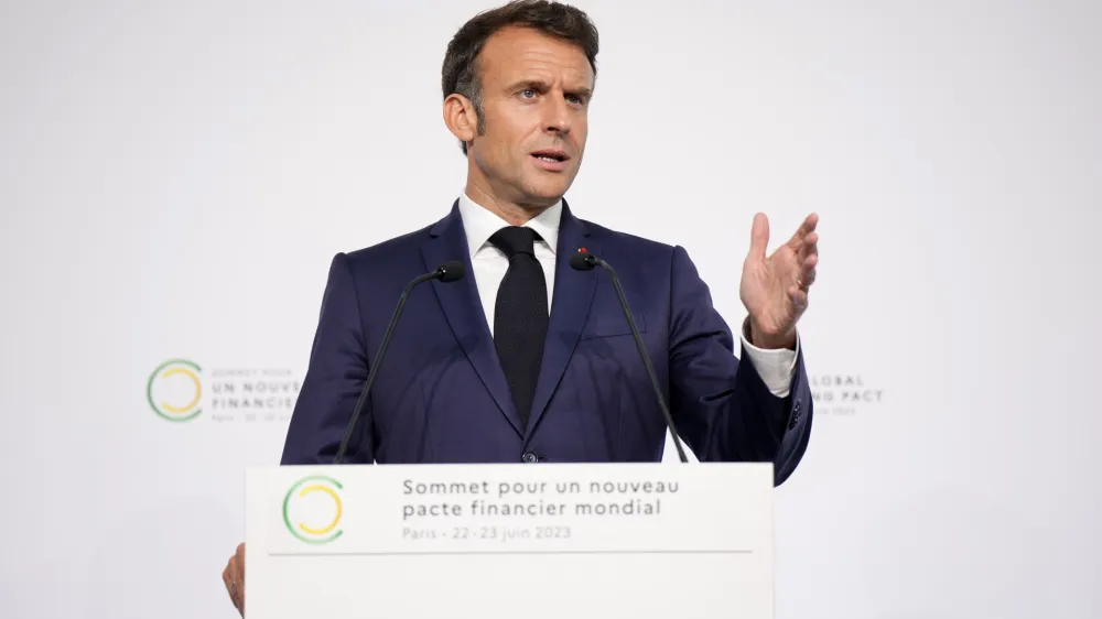 French President Emmanuel Macron speaks during a joint press conference with William Ruto, President of Kenya, Kristalina Georgieva, President ff the International Monetary Fund, U.S. Treasury Secretary Janet Yellen and World Bank President Ajay Banga at the end of the New Global Financial Pact Summit, Friday, June 23, 2023 in Paris.World leaders and finance bosses were set to release a "to-do list" to help developing countries better tackle climate change and poverty, a long-sought goal of the two-day summit in Paris that wraps up on Friday. (AP Photo/Lewis Joly, Pool)