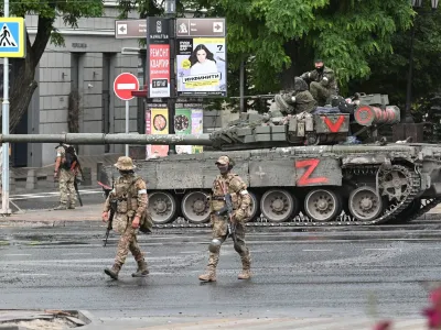 Fighters of Wagner private mercenary group are deployed in a street near the headquarters of the Southern Military District in the city of Rostov-on-Don, Russia, June 24, 2023. REUTERS/Stringer