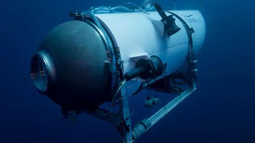 FILE - This undated image provided by OceanGate Expeditions in June 2021 shows the company's Titan submersible. The wrecks of the Titanic and the Titan sit on the ocean floor, separated by 1,600 feet (490 meters) and 111 years of history. How they came together unfolded over an intense week that raised temporary hopes and left lingering questions. (OceanGate Expeditions via AP, File)