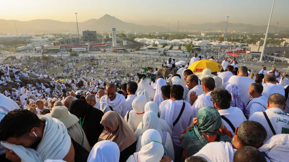 Muslim pilgrims walk on the Mount of Mercy at the plain of Arafat during the annual haj pilgrimage, outside the holy city of Mecca, Saudi Arabia, June 27, 2023. REUTERS/Mohamed Abd El Ghany