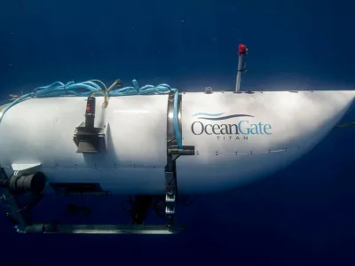 FILE PHOTO: The Titan submersible, operated by OceanGate Expeditions to explore the wreckage of the sunken SS Titanic off the coast of Newfoundland, dives in an undated photograph. OceanGate Expeditions/Handout via REUTERS NO RESALES. NO ARCHIVES. THIS IMAGE HAS BEEN SUPPLIED BY A THIRD PARTY./File Photo